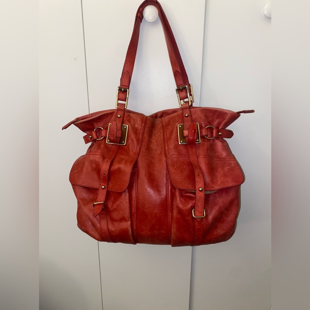 Orange 90’s style deep shoulder bag.